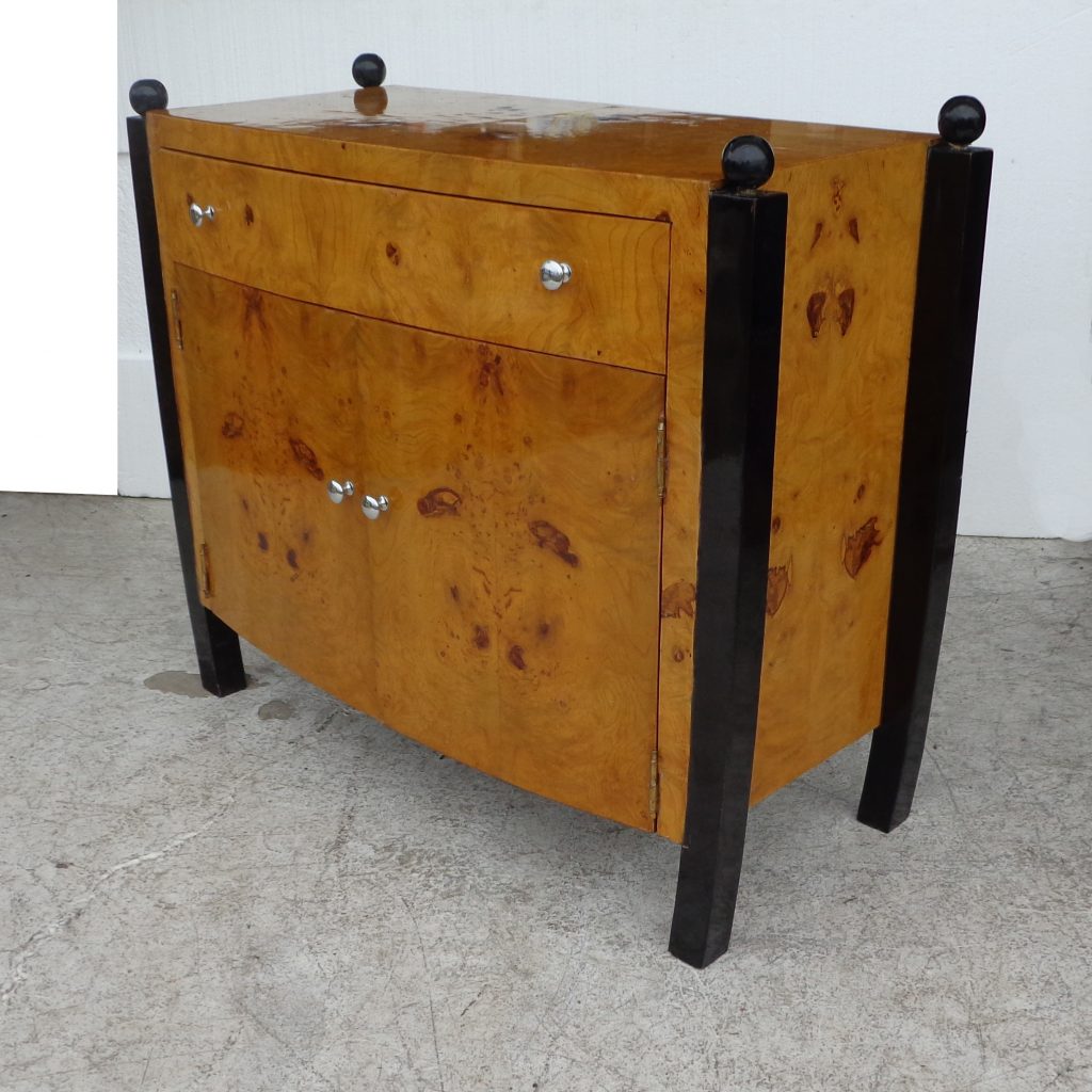 Art Deco side cabinet with rich wood grain