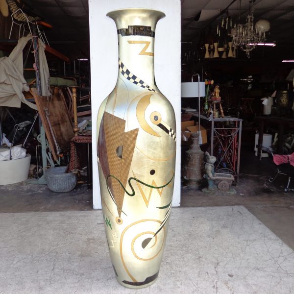Painted ceramic vase showing intricate artwork