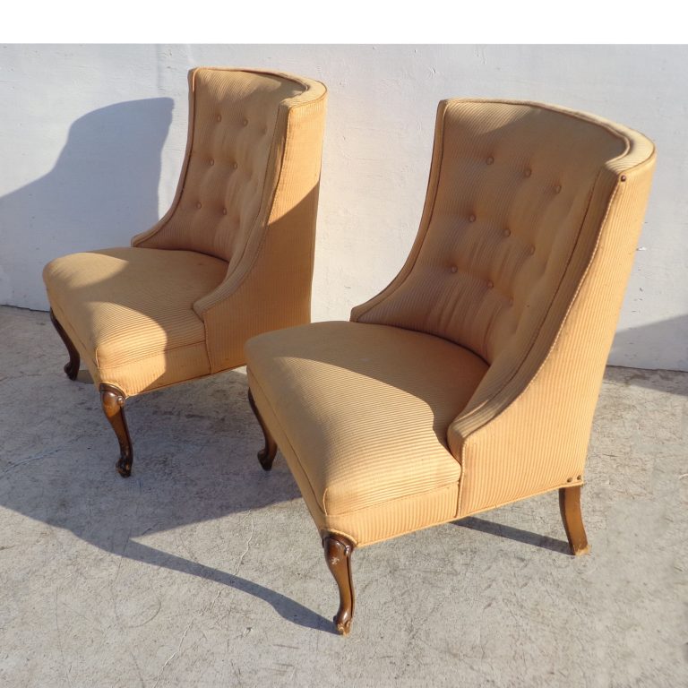 mid-century elegance to your home with these Regency-style Slipper Chairs, boasting button-tufted detailing and soft cushioning. Ideal for creating a cozy reading nook or stylish accent seating.