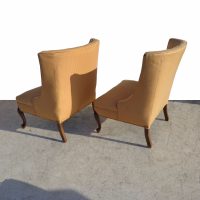 Mid-Century Modern Regency Slipper Chairs, designed with classic button tufting and graceful lines. Perfect for bringing vintage charm and relaxation to any room.