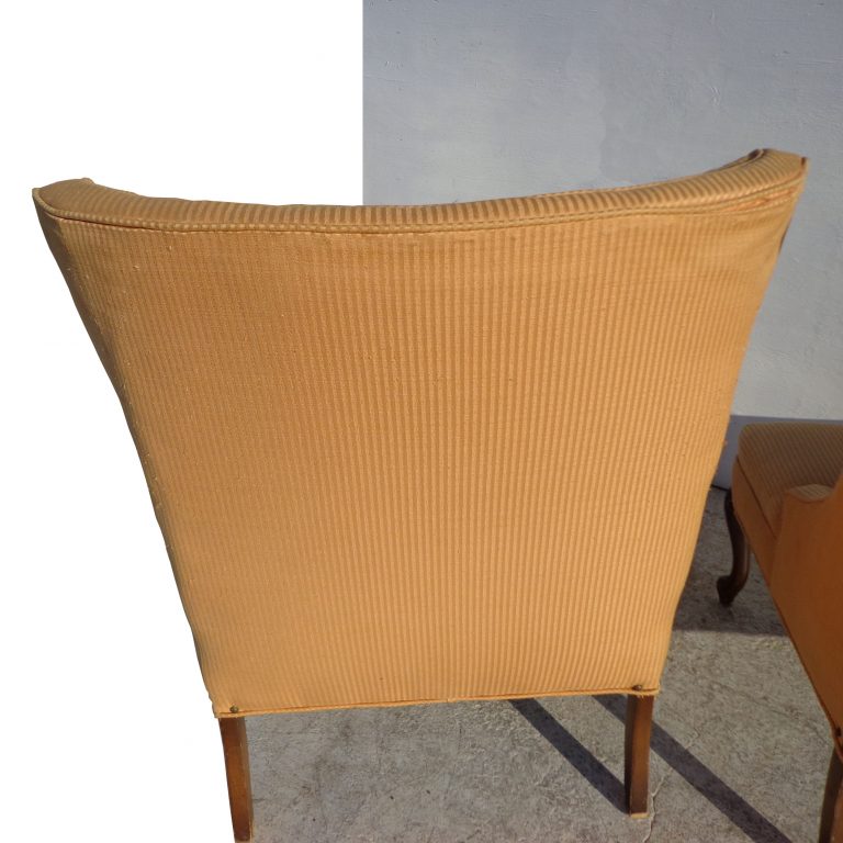 Regency-inspired Slipper Chairs, showcasing mid-century elegance and plush comfort. Create a welcoming atmosphere in your home with these stylish and functional seating pieces.