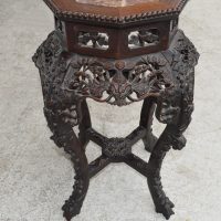 Timeless Chinese carved teak table with classic marble top