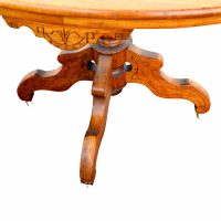 19th-century Eastlake style oak table with decorative base