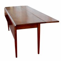 Fold-out leaf dining table in vintage mid-century style