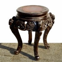 Classic vintage carved Chinese side table with decorative motifs