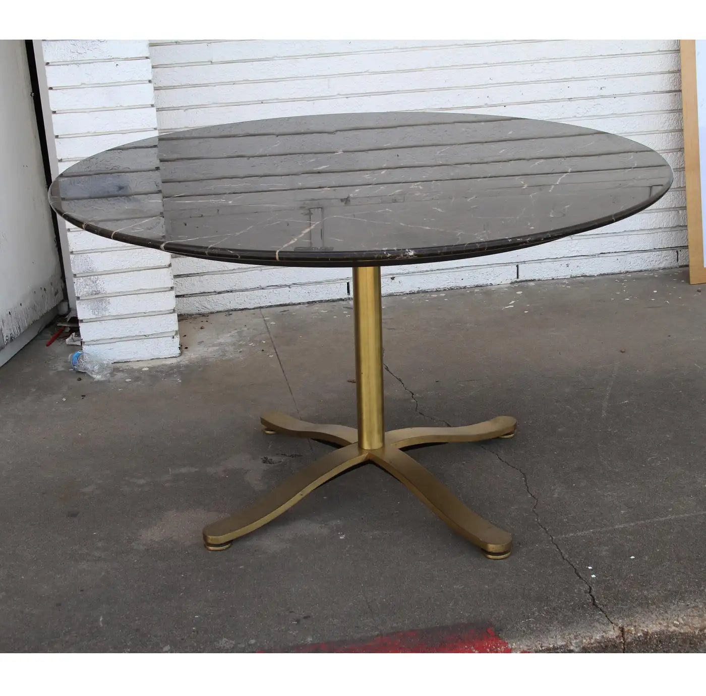 Designer marble dining table with bronze base