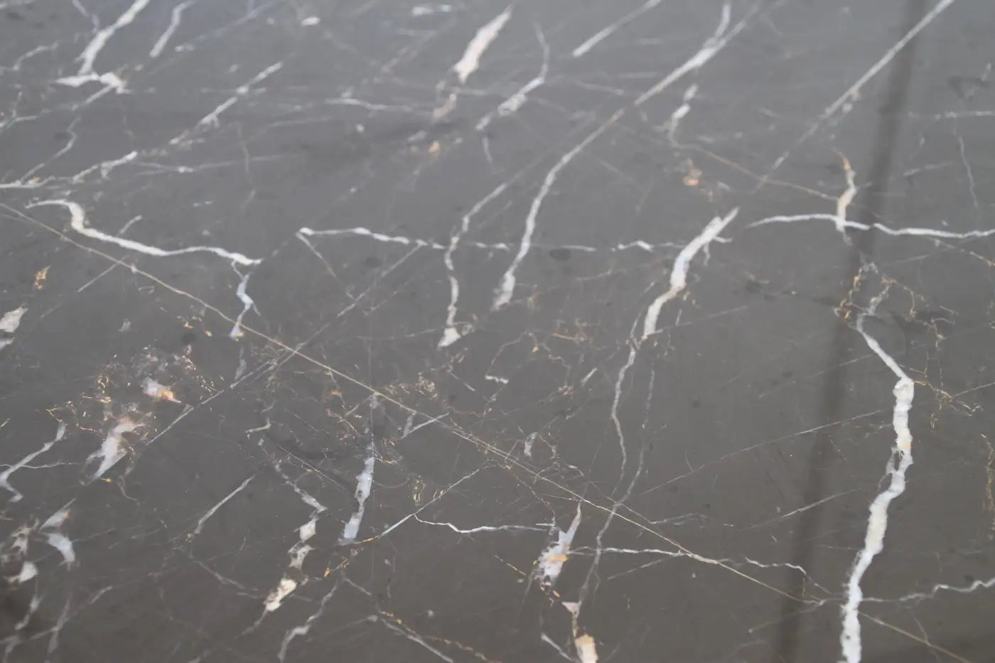 Bronze and marble dining table for modern interiors
