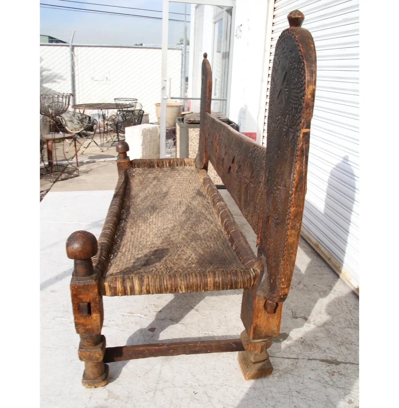 Wooden charpoi bench with woven top