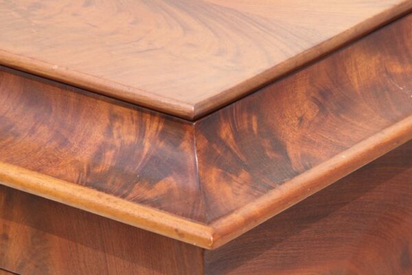Antique walnut dressing table with ornate features