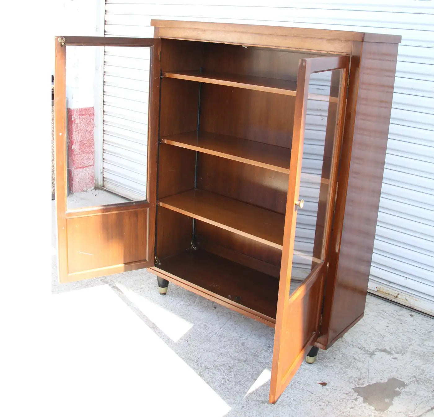 Tall open oak shelf by Bernhardt