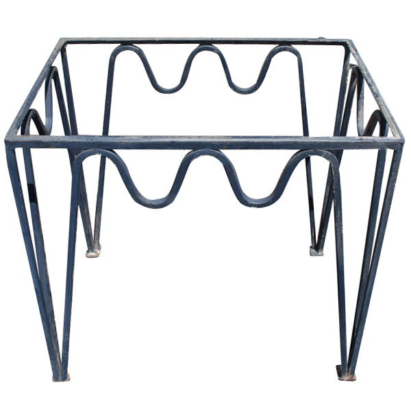 Vintage wrought iron dining table base measuring 30.25 by 20.5 inches with classic metal design