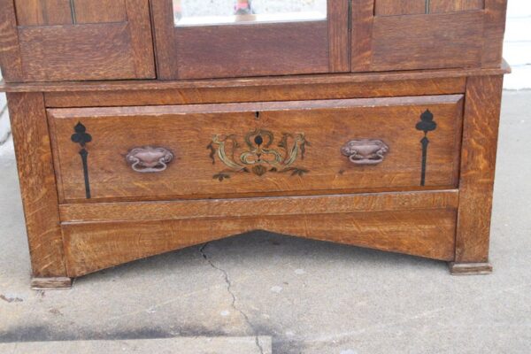 Antique oak armoire with mission design
