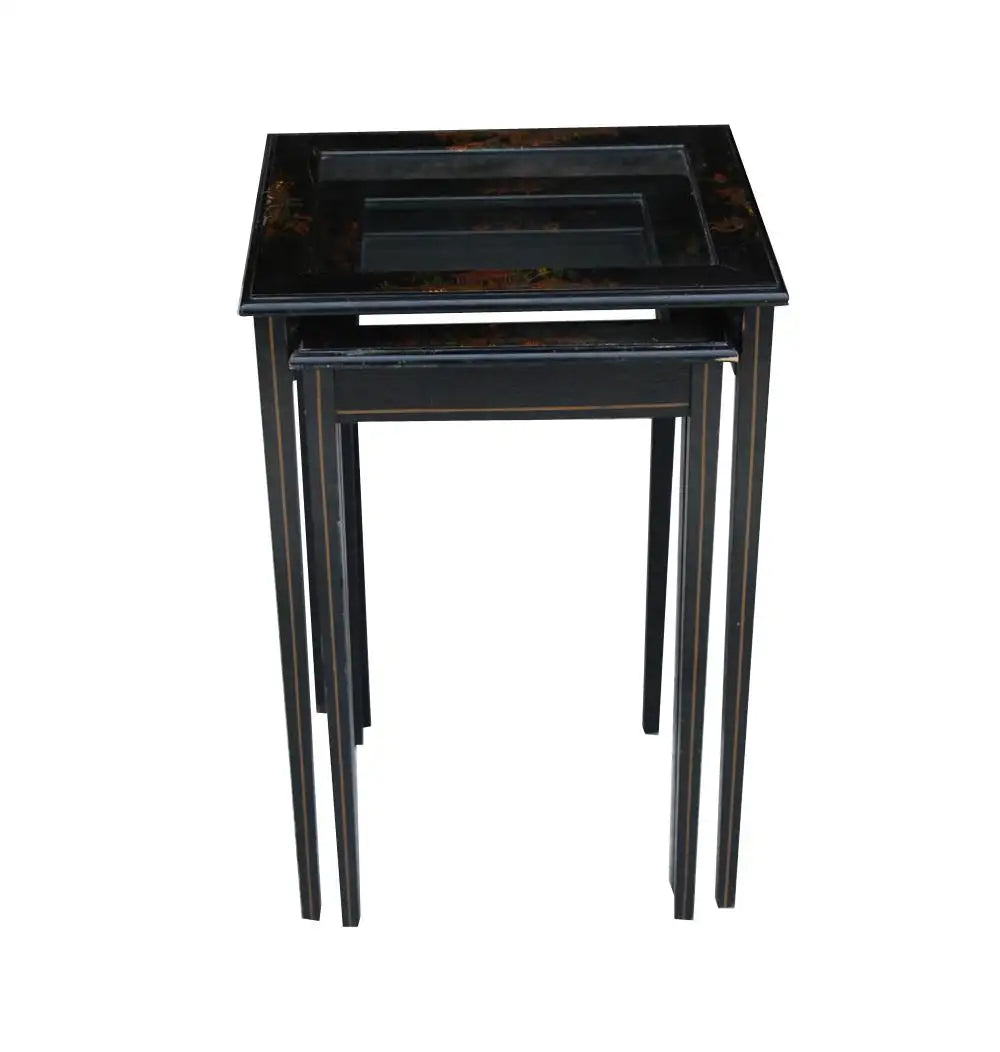 Vintage wooden nesting tables with intricate chinoiserie finish