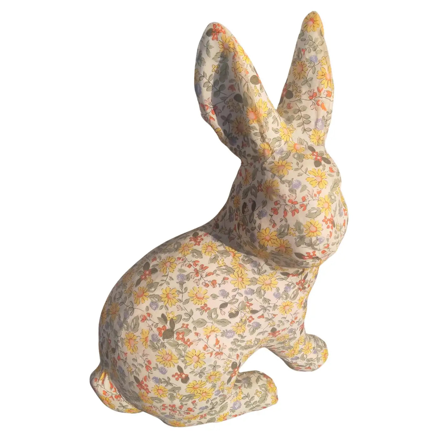 Fabric rabbit sculpture with colorful textile