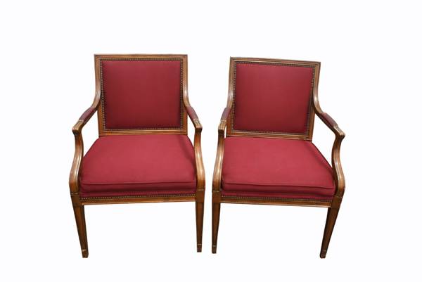 Classic red upholstered dining chairs by Baker Furniture