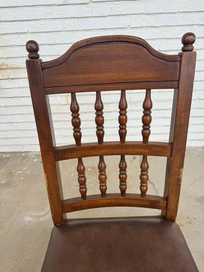 handcrafted wood frame chair with patterned upholstery