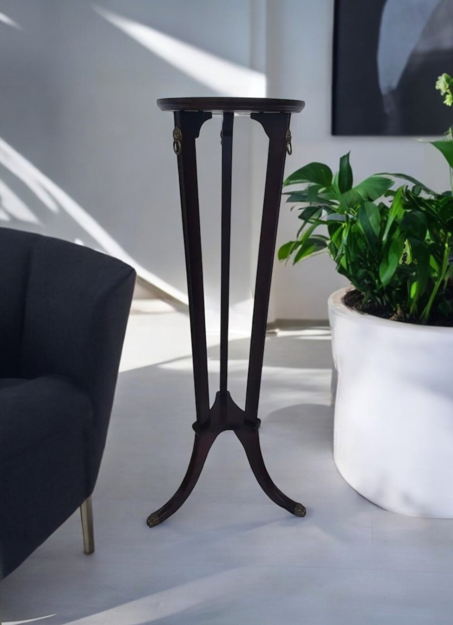 Regency style pedestal with brass accents
