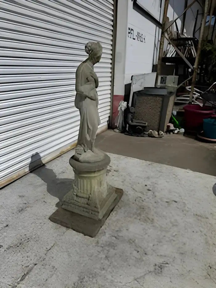 Shy Venus classical sculpture with pedestal