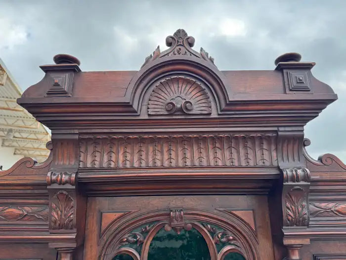 carved walnut buffet with architectural details