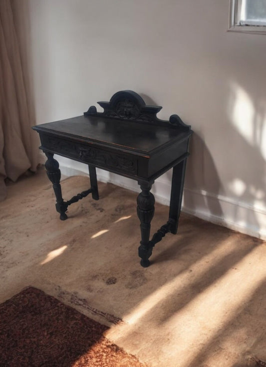 19th century Tudor style writing desk with lion carvings
