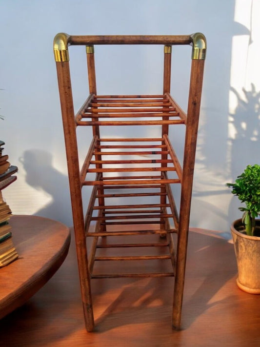 Bentwood wine rack with brass accents