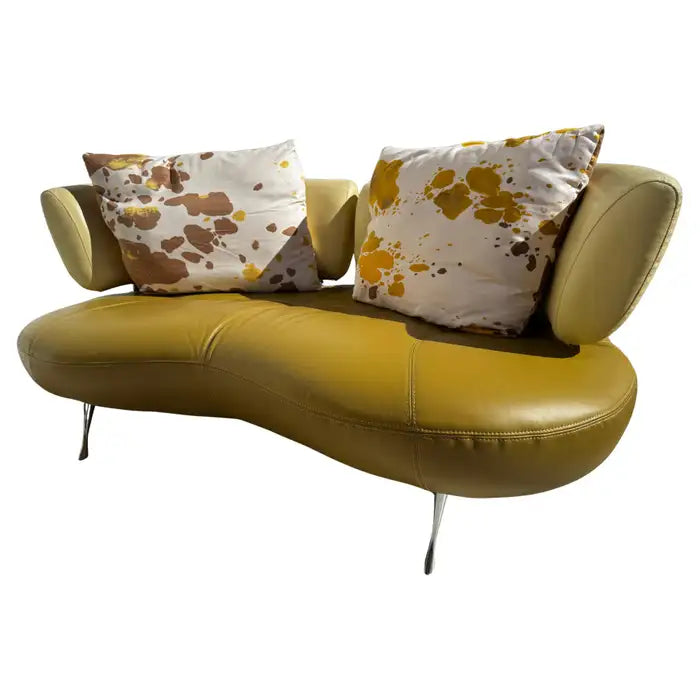 68 inch biomorphic leather sofa with sculptural curved design