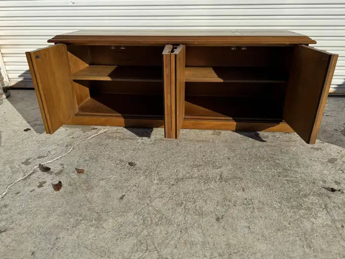 American made walnut buffet with stone top detail