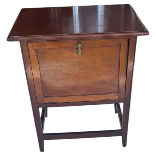 Antique carved wood smoking stand with drop-front storage