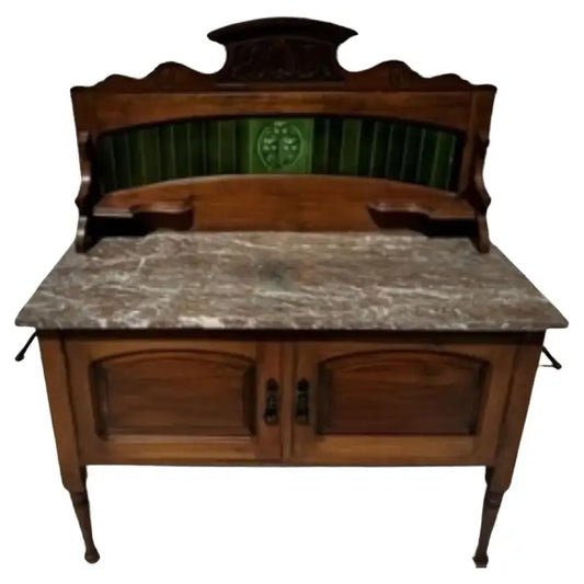 Antique wood sideboard with marble top and carved detailing