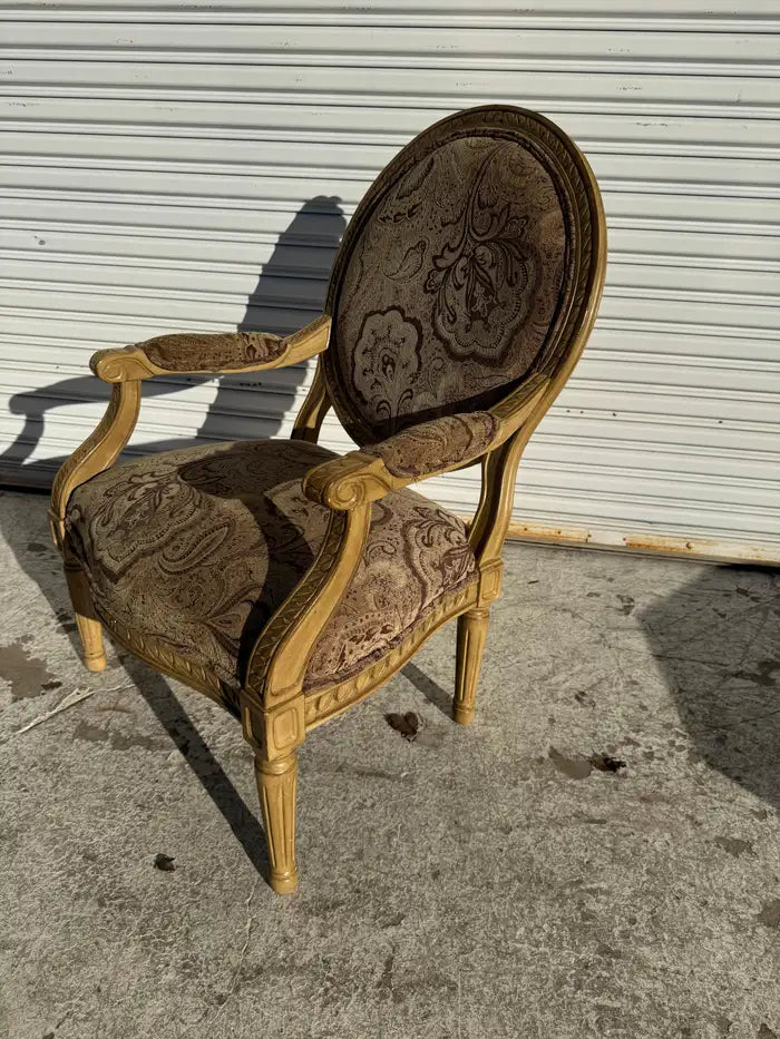 French bergere armchair featuring oval medallion back and fluted legs
