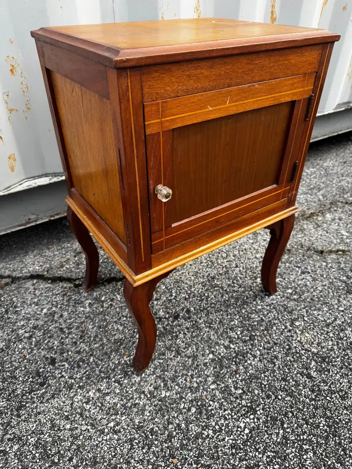 Vintage walnut nightstand with decorative wood inlay