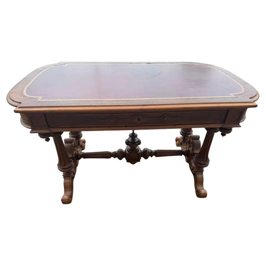 Antique walnut executive desk with maroon leather writing surface