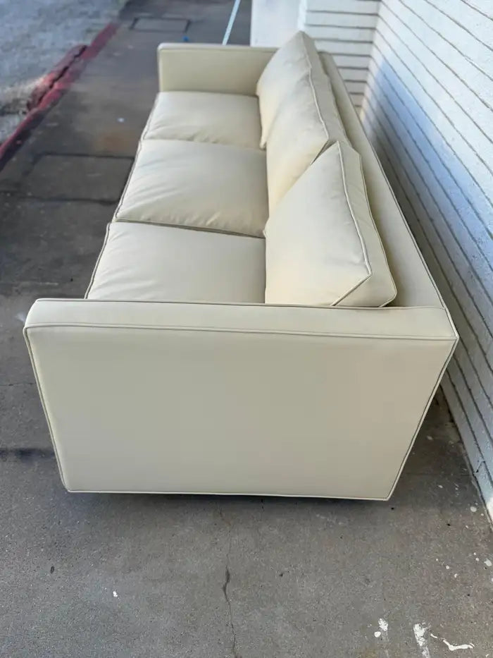 Restored vintage modern couch with plush seating