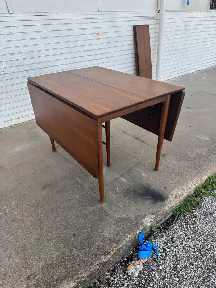 Rectangular walnut dining table with extended leaves