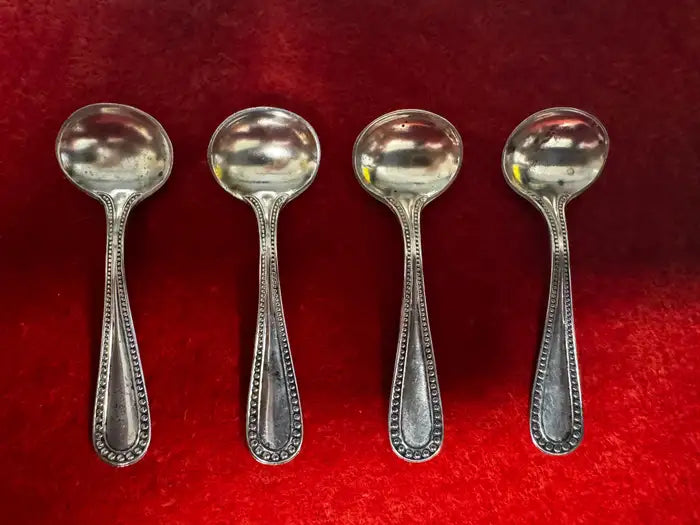 Vintage silver salt spoons with beaded edge
