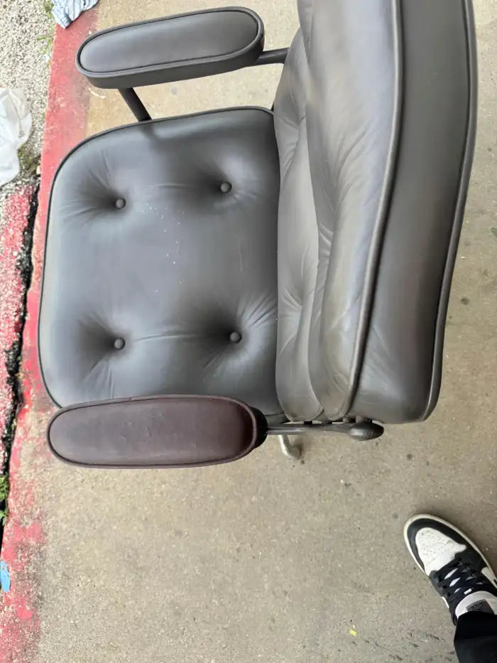 Vintage leather swivel office chair for executive workspace