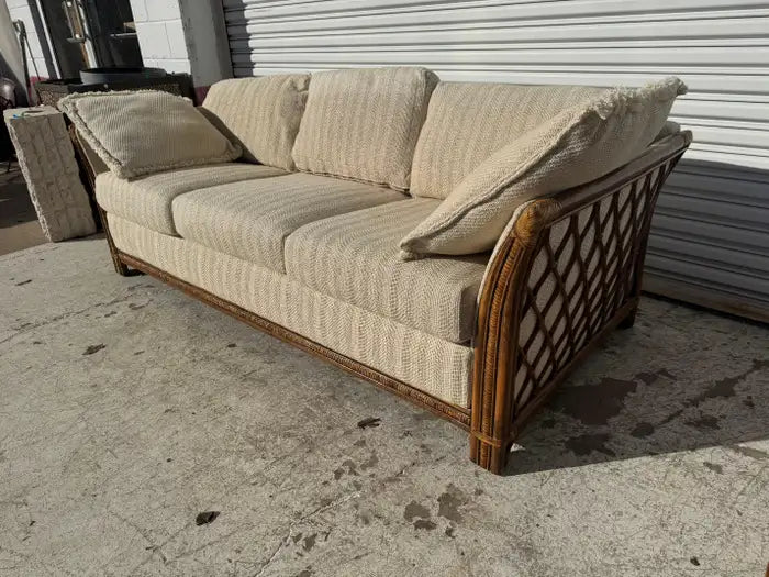 Bamboo and rattan couch with curved frame