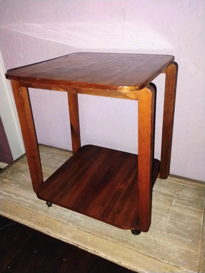 Vintage tea trolley with glossy wood finish