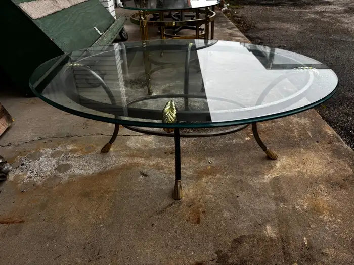 Steel frame coffee table with brass detail