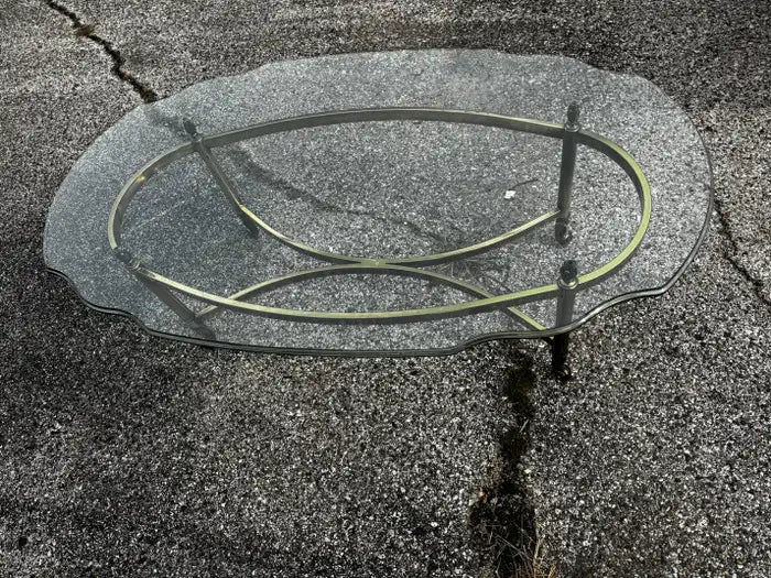 Modern brass and glass oval coffee table