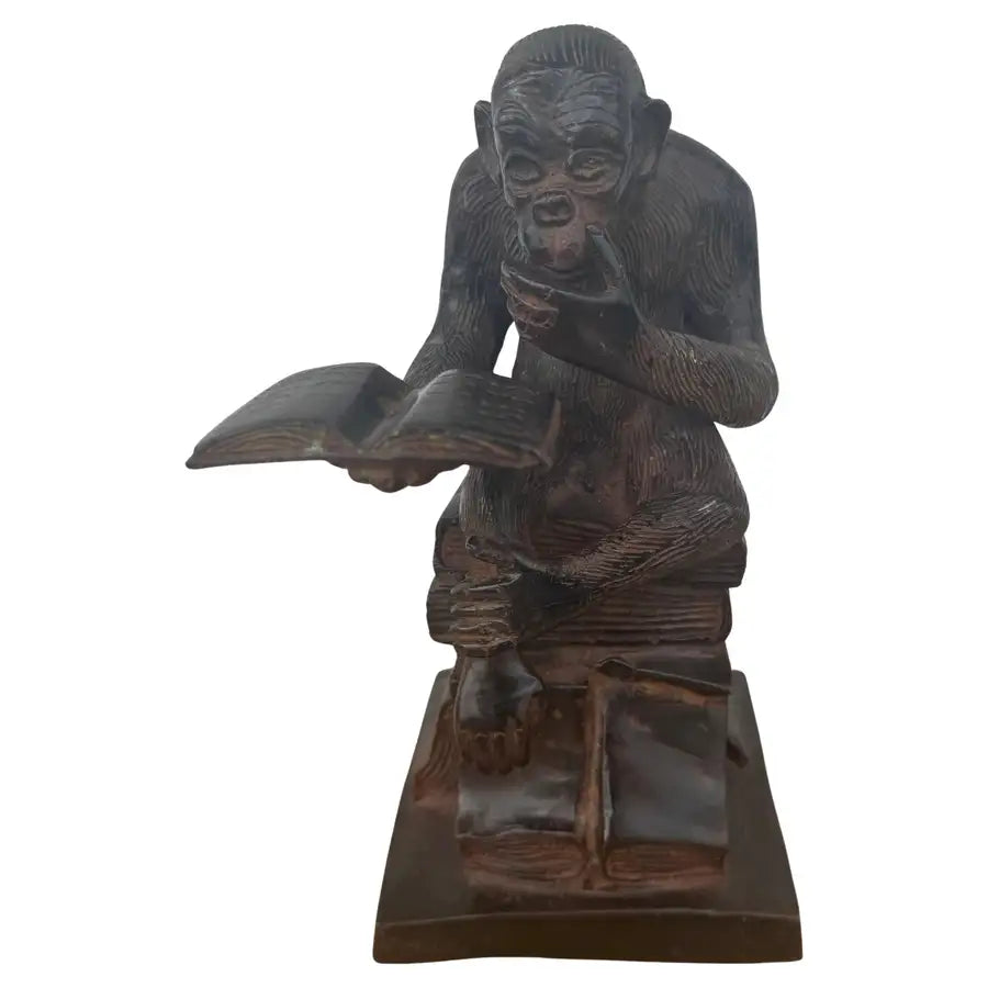 bronze thinking monkey sculpture in contemplative pose