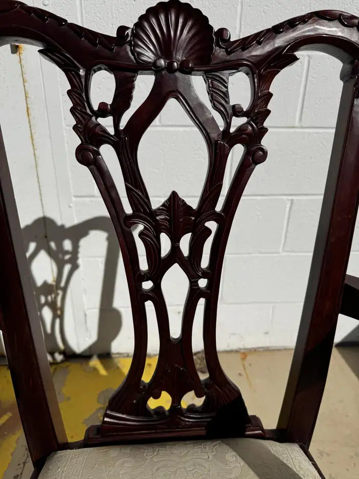 Traditional mahogany armchair with carved details