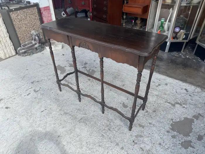 Decorative carved wood console table for elegant entryway decor