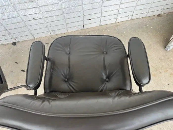 Eames executive chair with polished aluminum frame