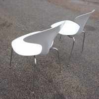 Stylish ergonomic plastic dining chairs by Bernhardt