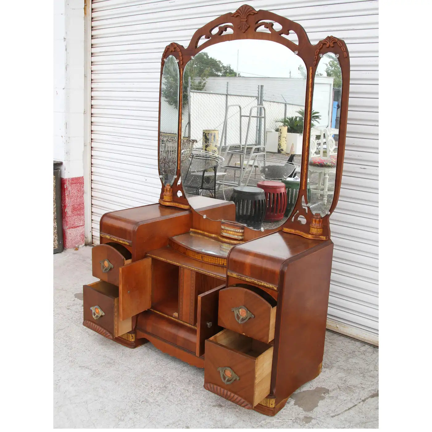 Side view of Art Deco antique waterfall dresser