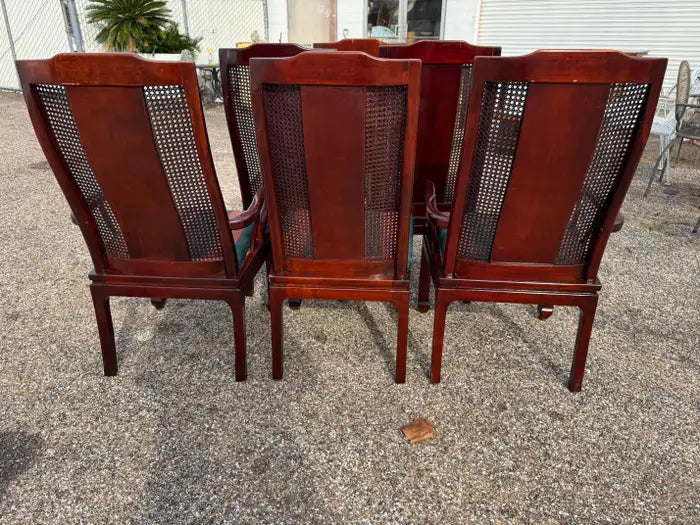 High end mahogany dining chairs with woven cane