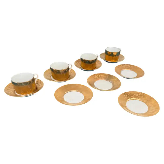 Antique tea service gold accented porcelain cups elegant dining decor