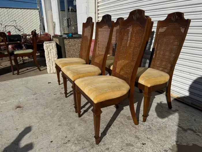 Vintage cane back chairs with brass detailing