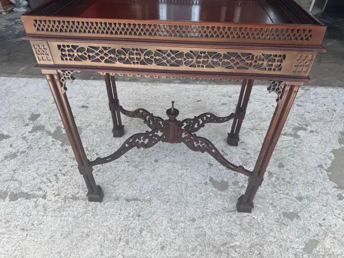 Traditional mahogany side table with elegant decorative design